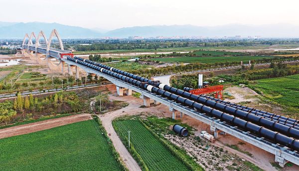 业创国内大直径钢管跨河架空输水新纪录pg模拟器电脑版破解敷设难题 宝石管
